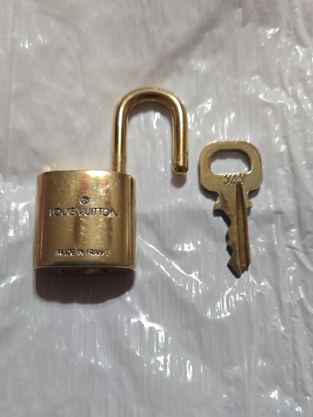 Louis Vuitton Gold Padlock Set of Four with LV Monogram - Picture 3 of 6